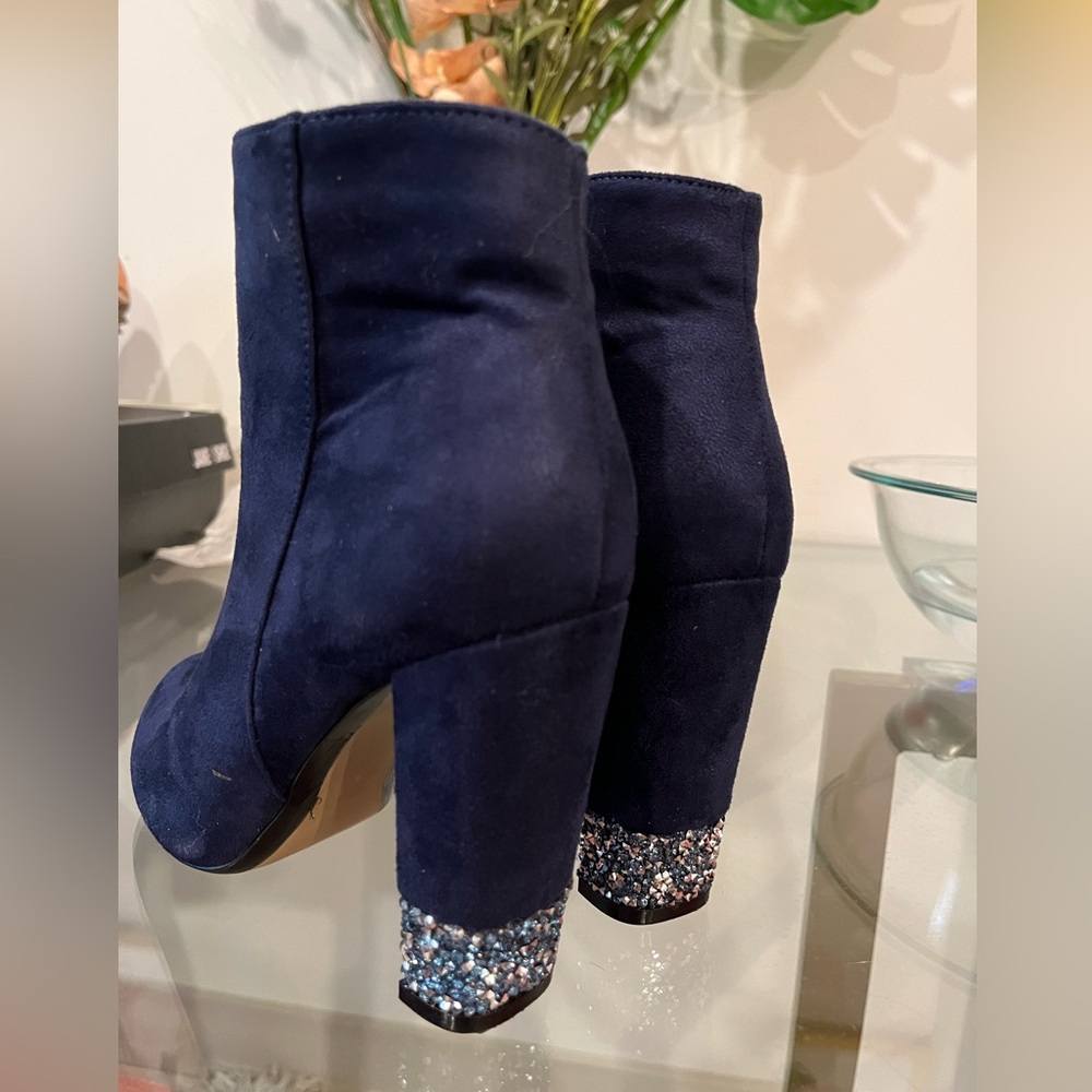 XOXO boots - only warn once.Crystal blue shield detailing in like new condition.
